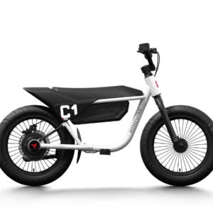 alt="Child joyfully riding the Himiway C1 Kids Electric Bike through a park, showcasing its vibrant design and outdoor adventure capabilities."